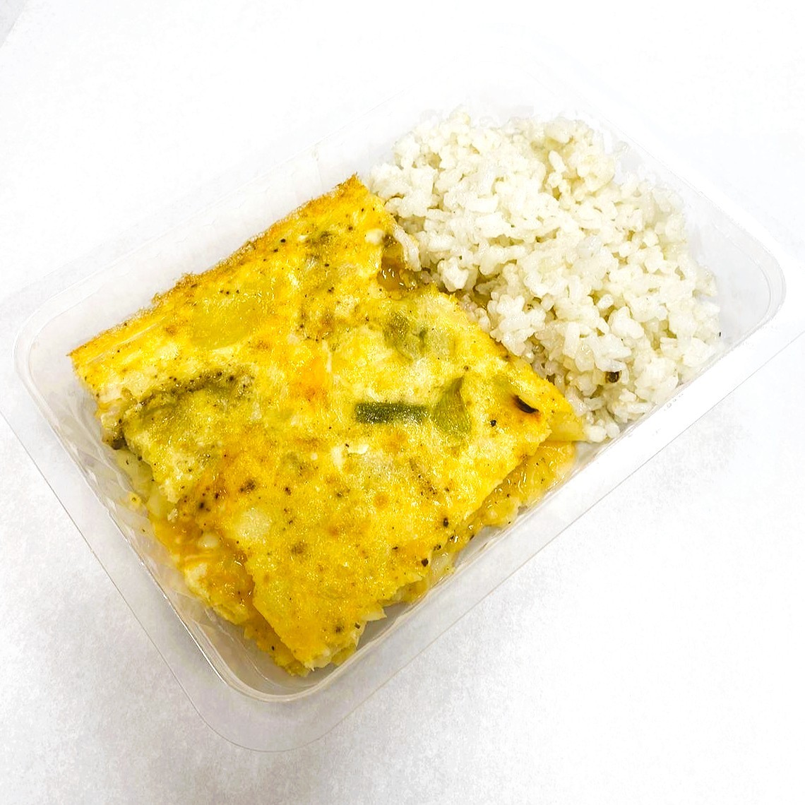 Tortilla de Bacalao con Ajetes y Arroz Salteado