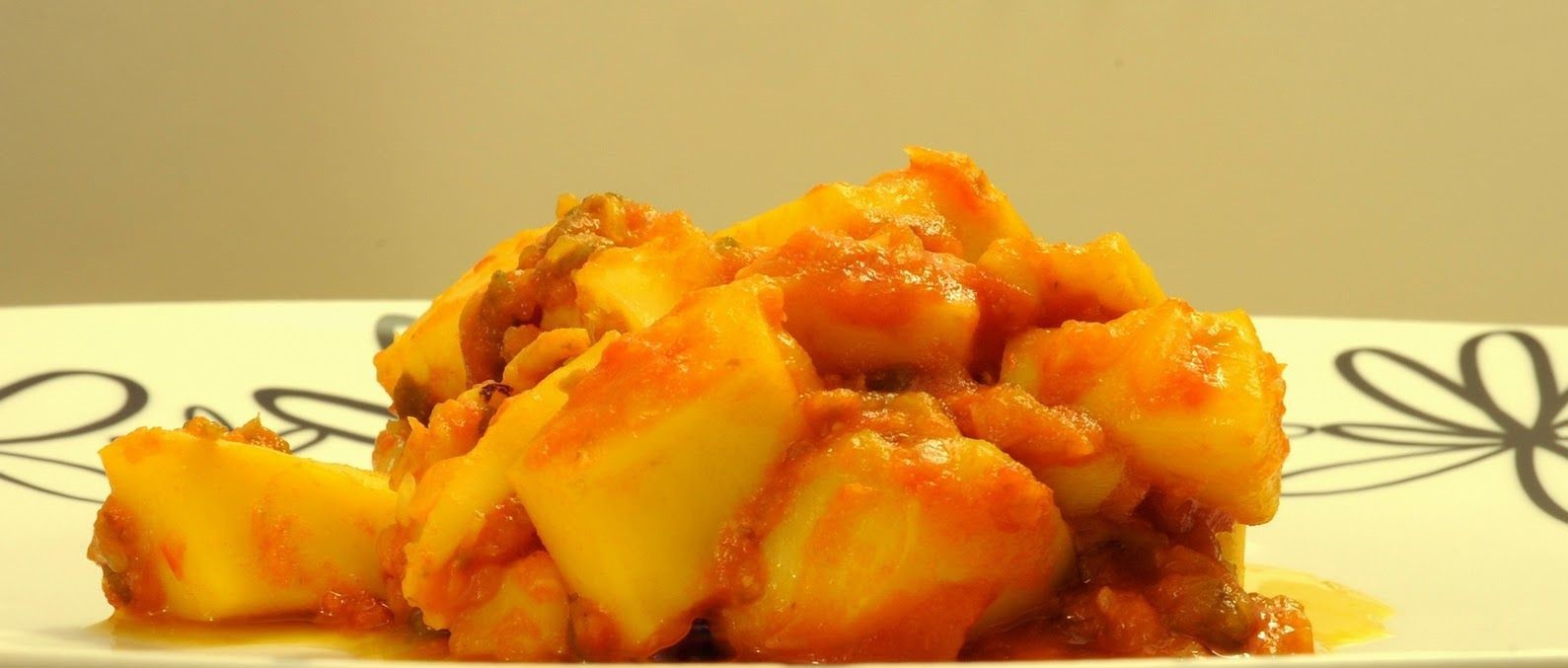 Sepia con Tomate y Pimientos