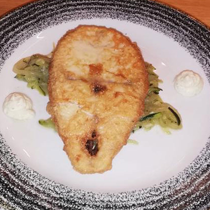 Merluza A La Romana con patata confitada